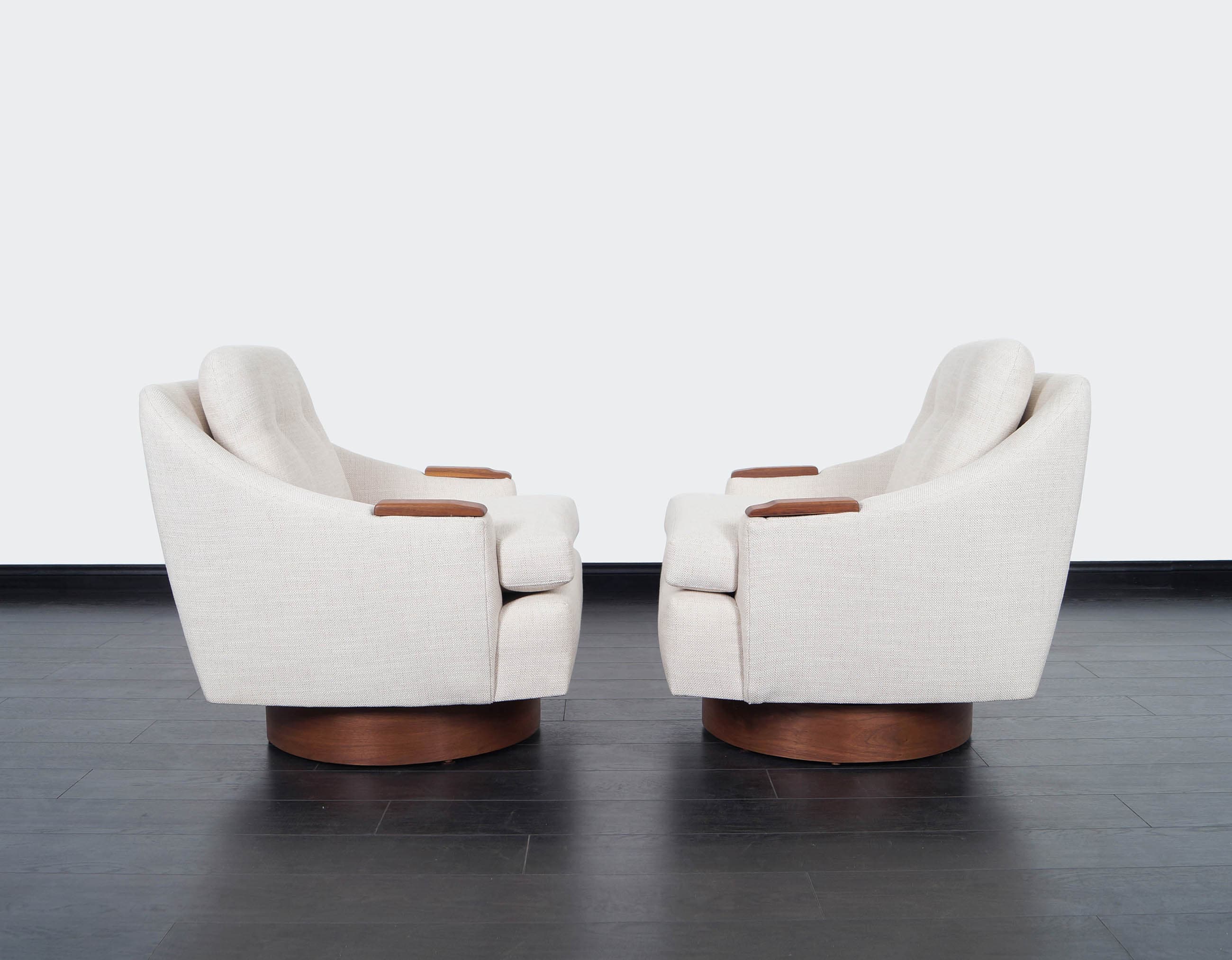 Mid Century Walnut Swivel Lounge Chairs