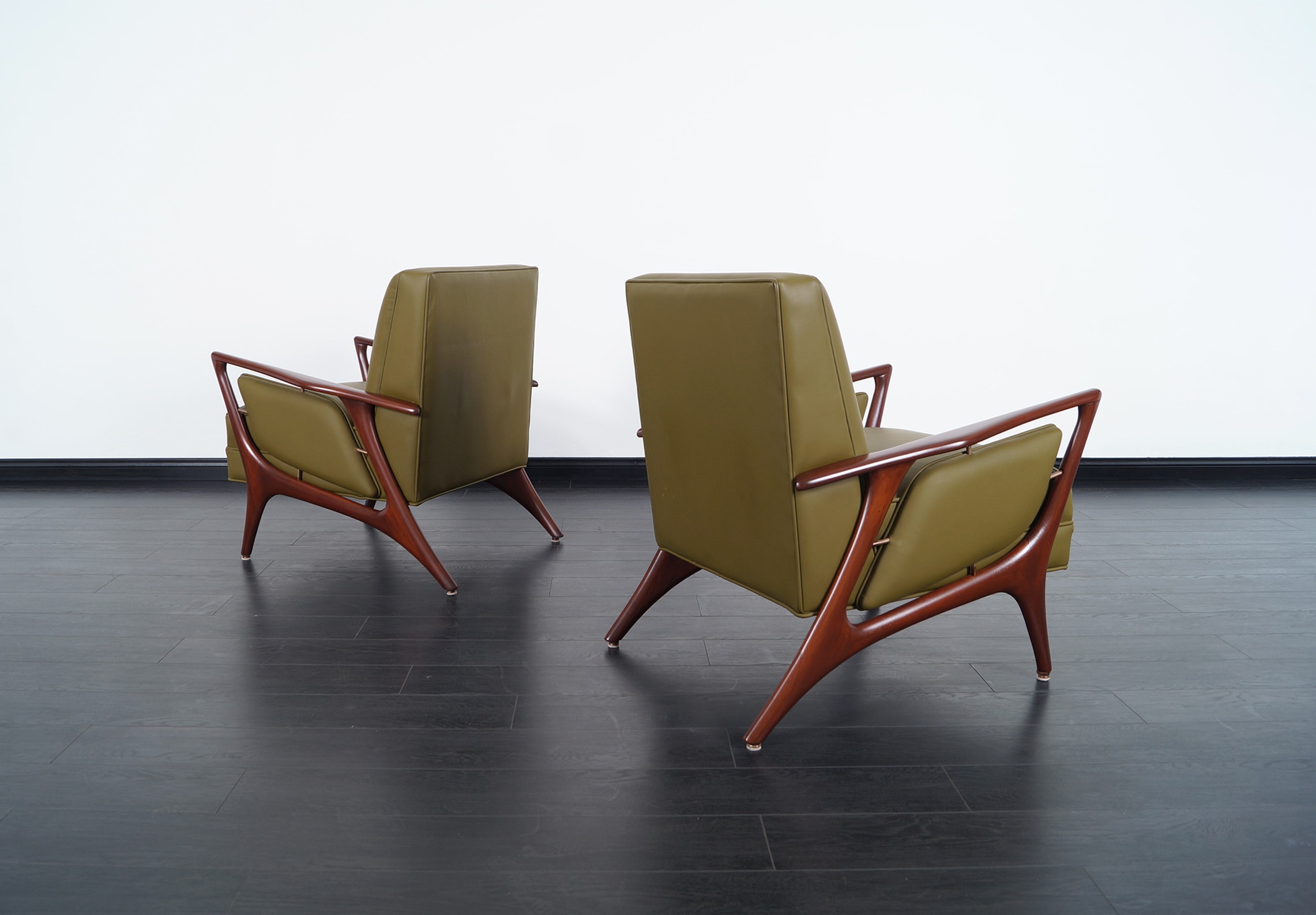 Mid Century Leather Lounge Chairs by Eugenio Escudero