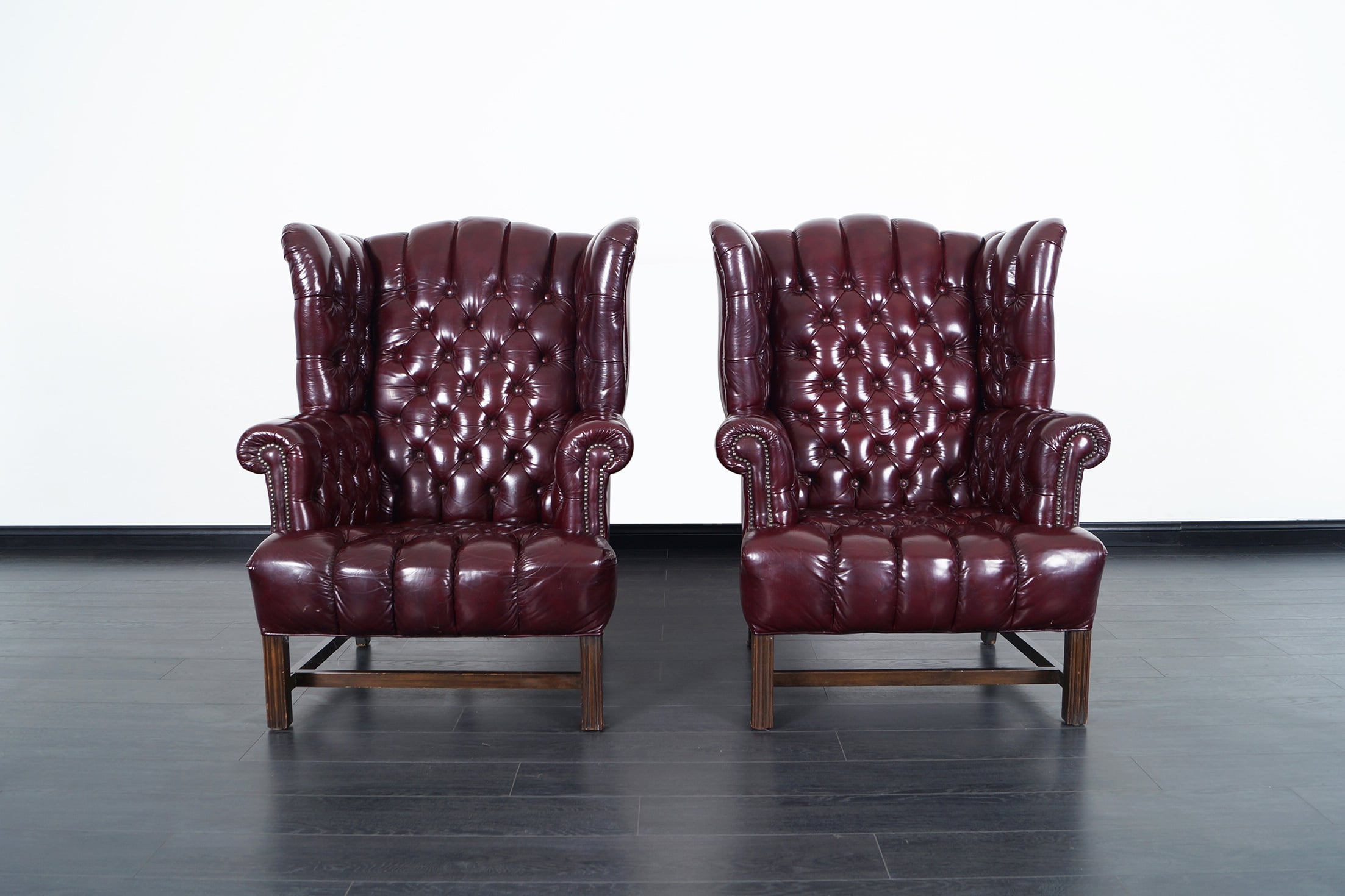 Vintage Leather Tufted Wingback Chairs