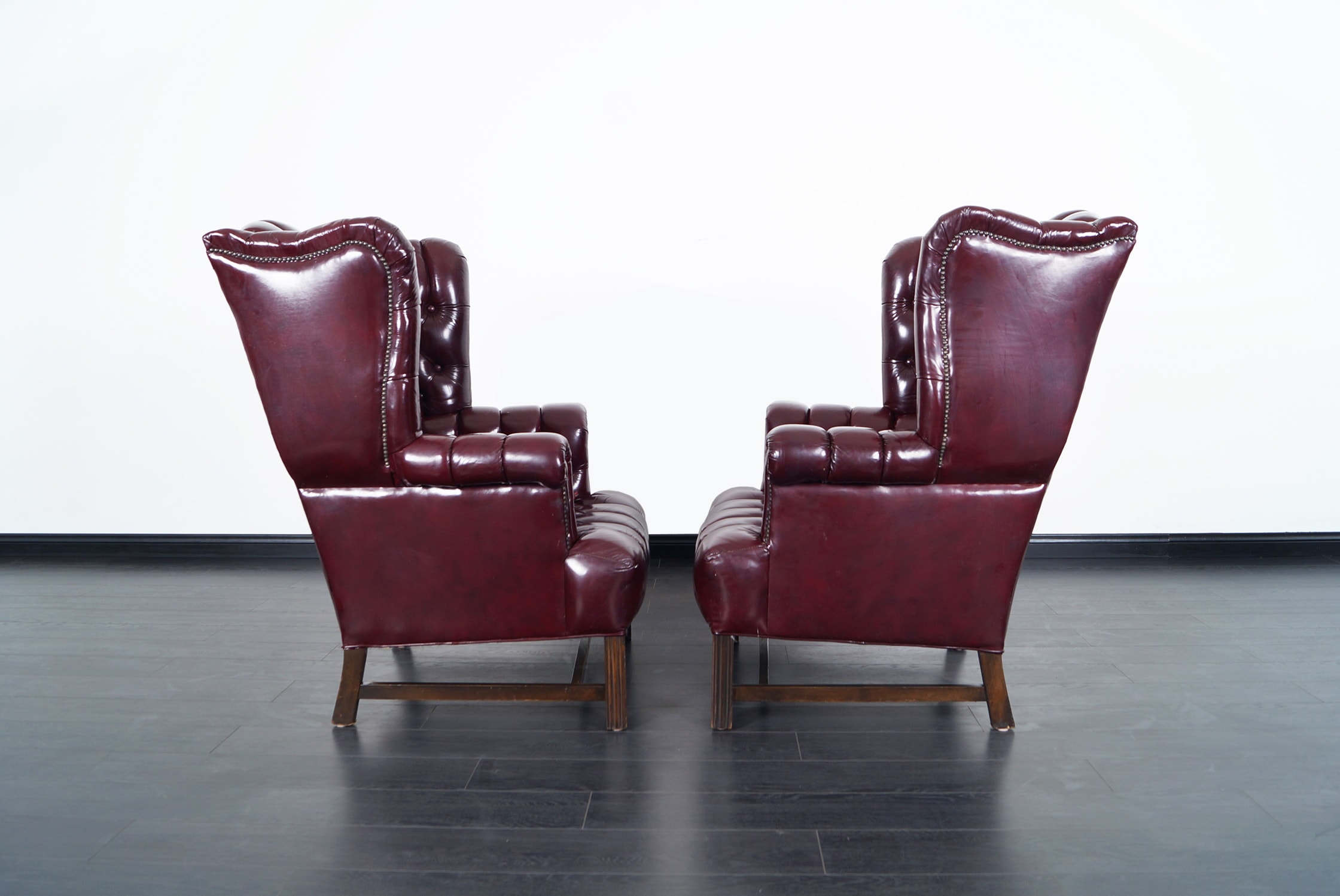 Vintage Leather Tufted Wingback Chairs