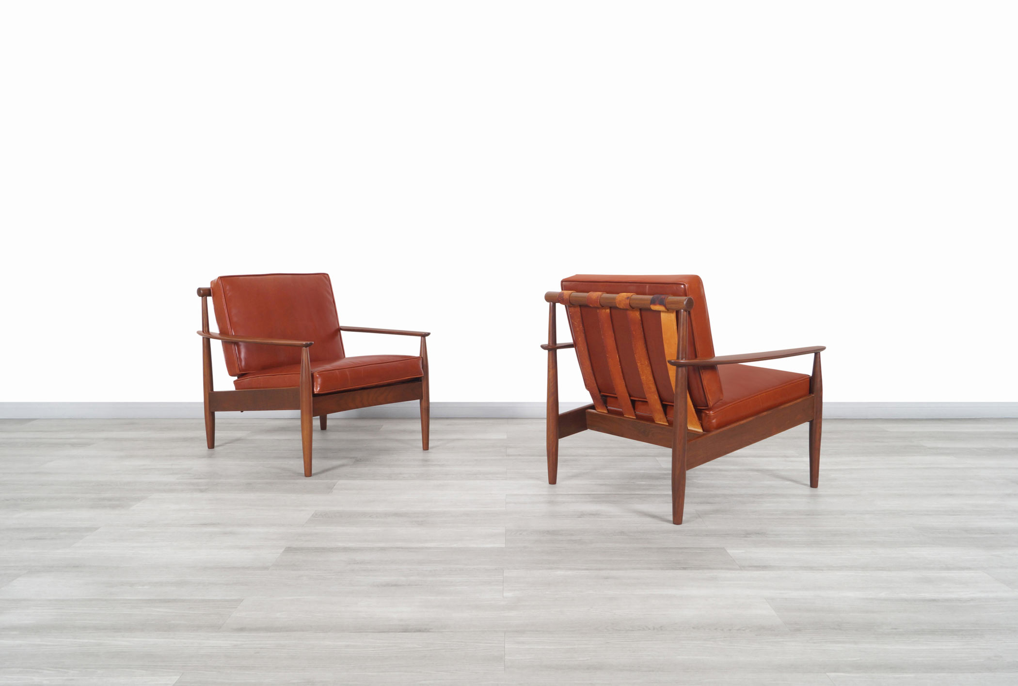 Danish Modern Leather and Walnut Lounge Chairs by Hans C. Andersen