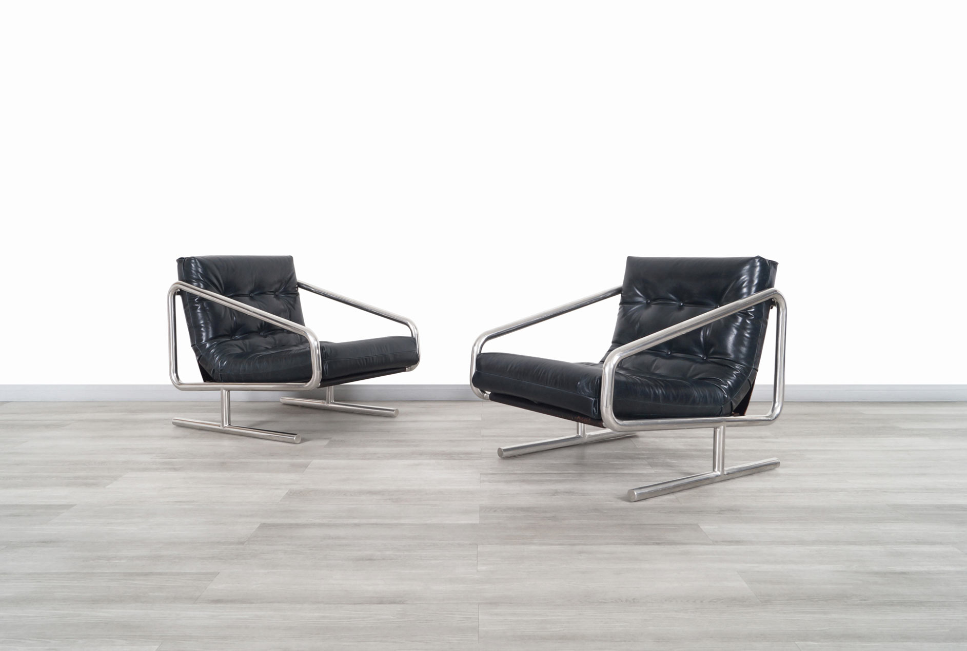 Vintage Leather and Aluminum Lounge Chairs